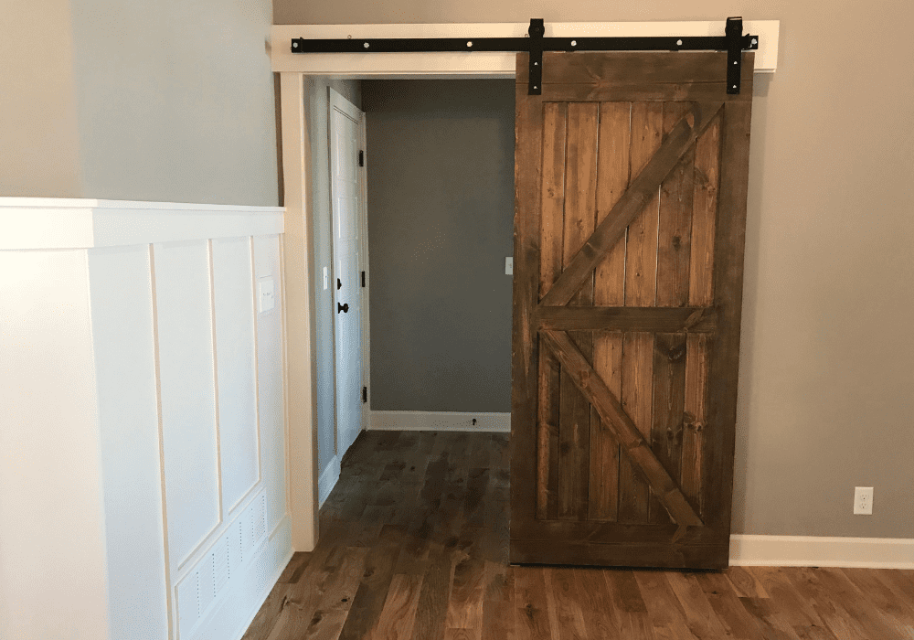 Steps to Hang a Barn Door from the Ceiling