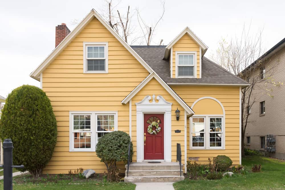 popular front door colors for yellow house