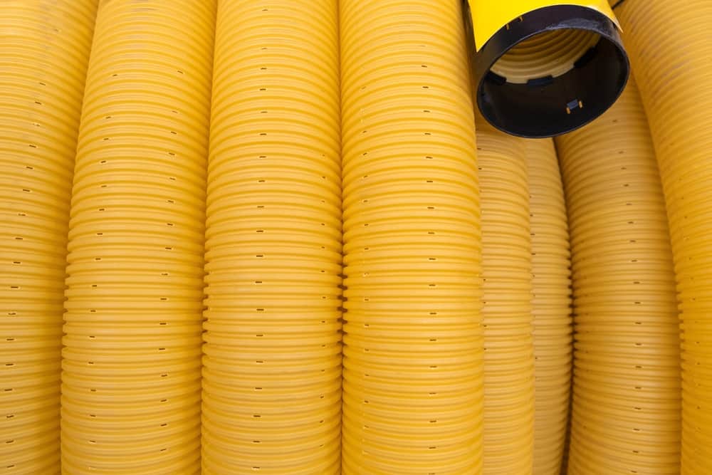 how to install perforated drain pipe