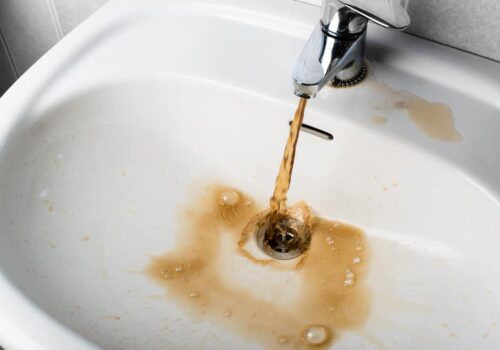 Burst Of Black Water From Faucet (Causes & Solutions)